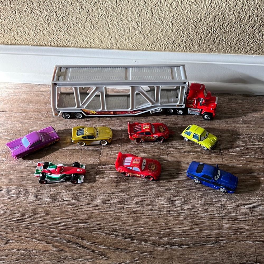Disney Cars Mack Trailer and 7 Cars set